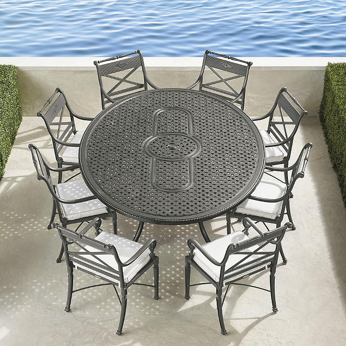 Carlisle 9-pc. Oval Dining Set in Slate Finish + Cushions